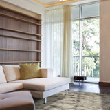 Olive Viscose Rug – Annamitique, in a living room
