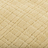 Vloerkleed geel van gerecycled PET – Mako – detail van de weving (2)