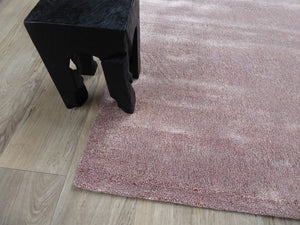 Tapis uni doux viscose rose