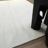 Tapis blanc en laine – Milhac, dans un salon