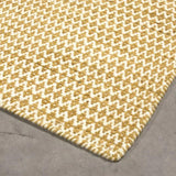 Vloerkleed geel en wit van wol – Milhac – detail van de rand