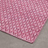 Tapis de couloir rose en laine – Milhac : détail de la bordure