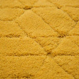 Tapis jaune en laine – Cory : détail du tissage