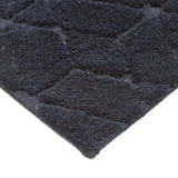 Tapis noir en laine – Cory : détail de la bordure