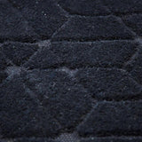 Tapis noir en laine – Cory : détail du tissage