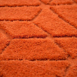 Vloerkleed oranje geometrisch van wol – Cory – detail van de weving