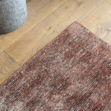 Terracotta & Grey Wool Silk Rug – Magnifico – close-up of the edge