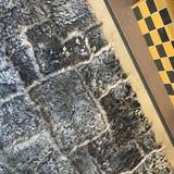 Teppich Grau Hochflor aus Wolle – Baipal – Detail der Kante