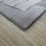 Teppich Grau Hochflor aus Lammwolle – Baipal – Detail der Kante