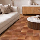 Brown Cowhide Leather Rug – Sparkless, in a living room