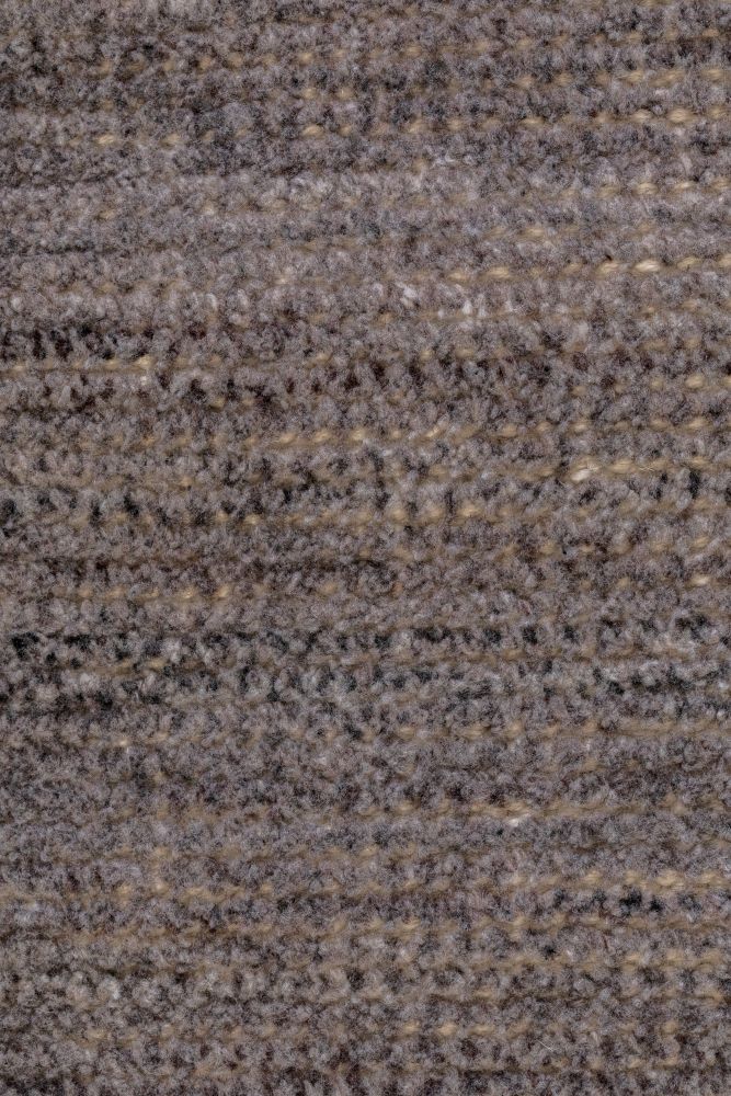 détail texture tapis vintage responsable en PET recyclé marron beige, fibres résistantes intérieur extérieur
