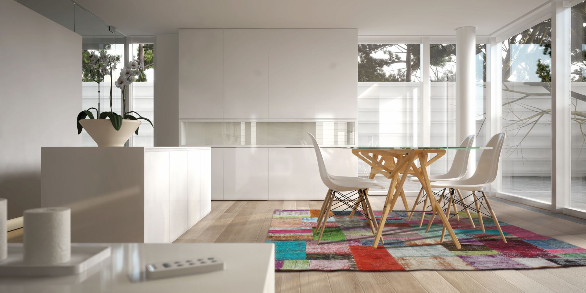 Tapis patchwork recyclé multicolore en laine et coton intégré sous une table à manger