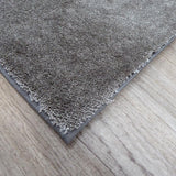 Alfombra gris de polyamida 60x140 – Pacs – detalle del borde