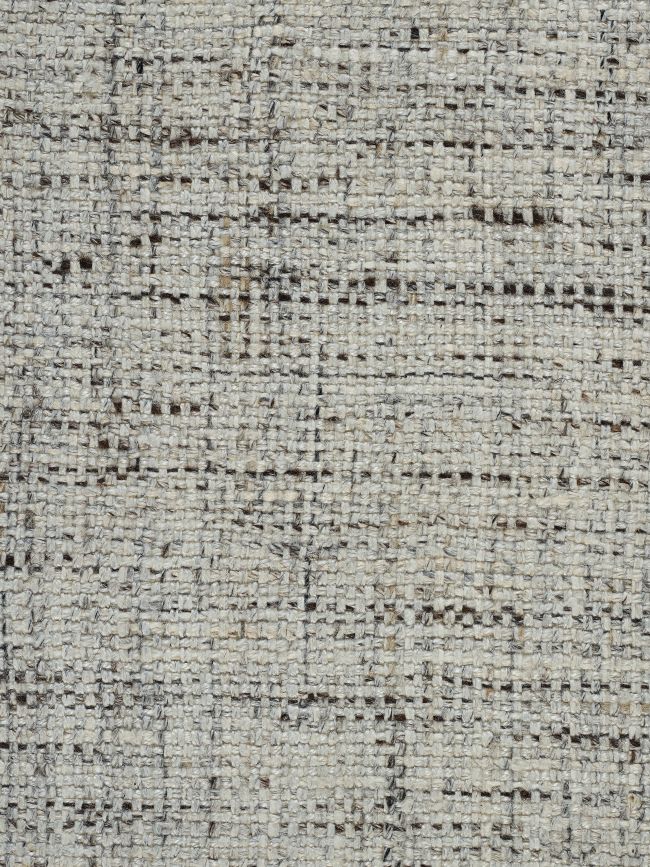 Détail du tapis blanc gris tissé main – gros plan sur la texture mêlant laine et viscose