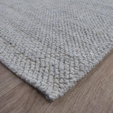 Alfombra redonda blanca de lana Ø 90 cm – Lagoon – detalle del borde