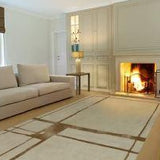 Vloerkleed beige en goud wol en viscose – Signature, in een woonkamer