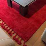 Red Berber Wool Rug – Boumia, in a living room (2)