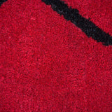 Tapis berbère rouge et noir en laine – Boumia : détail du tissage