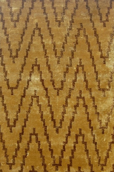 Auberginepaars geometrisch patroon vloerkleed van Nieuw-Zeelandse wol en viscose.