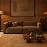 Tapis marron et orange tissé main – Emporium, dans un salon