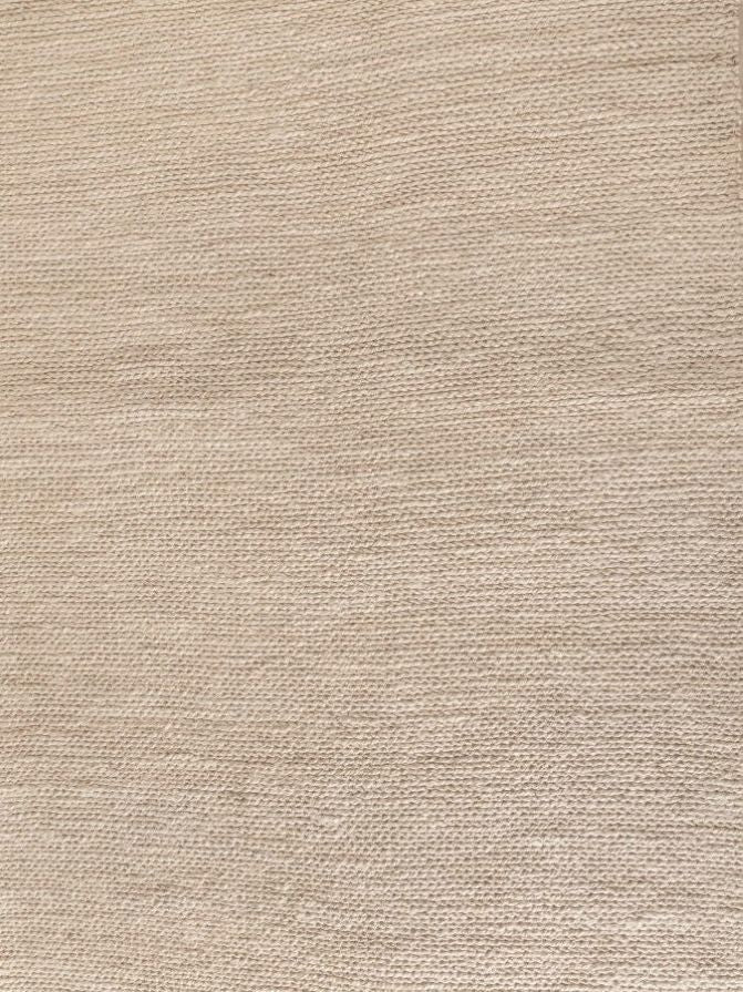 Tapis d’été ivoire en jute, vu de face, texture naturelle et élégante