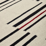Alfombra bereber marfil, negro y rojo de lana – Hazara – detalle del tejido