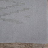 Light Grey Wool and Viscose Rug – Ikat – close-up of the edge