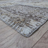 Alfombra beige vintage de lana y algodón – Up Square – detalle del borde