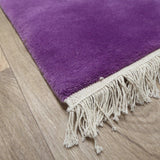 Alfombra violeta de pelo corto de lana – Kathmandu – detalle del borde