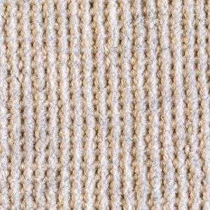 Zoom sur la texture du tapis vintage gris ivoire en PET recyclé, tissage durable pour usage intérieur ou extérieur