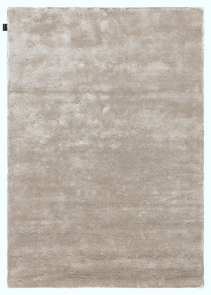 Tapis beige en viscose vu de face, texture douce et élégante