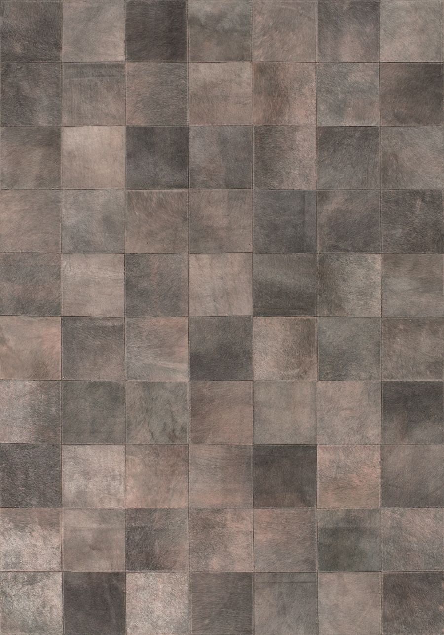 Tapis audacieux cuir de vachette motifs géométriques gris taupe