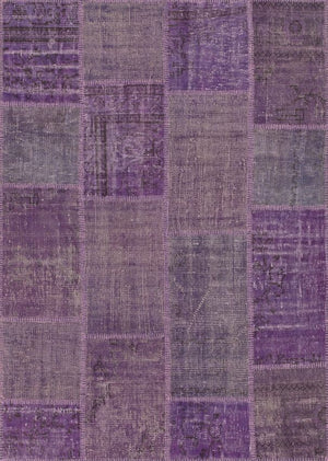 Tapis patchwork recyclé motifs en laine et coton violet, vue de face, montrant l’ensemble du design