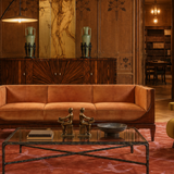 Tapis orange en laine et viscose – Sydney, dans un salon