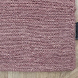 Tapis rose en laine – Kito : détail de la bordure