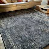Vloerkleed zwart van wol en polyamide 300x250 – Magnifique, in een woonkamer (2)