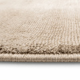 Tapis rond vintage beige en viscose – Erica : détail de la bordure