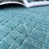 Tapis rond bleu turquoise en PET recyclé 250R – Mako : détail du tissage