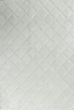 Tapis en laine de Nouvelle-Zélande blanc, à relief et motifs géométriques, vu de face