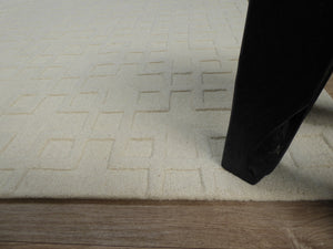Promotion grand tapis à motifs géométriques blanc 100% laine