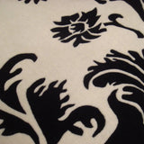 Teppich Schwarz und Weiß aus Wolle – Emporio – Detail der Webstruktur