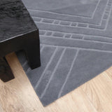 Vloerkleed grijs van wol – Eden – detail van de rand