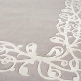 Alfombra floral rosa de pelo corto de lana y viscosa – Sydney – detalle del borde