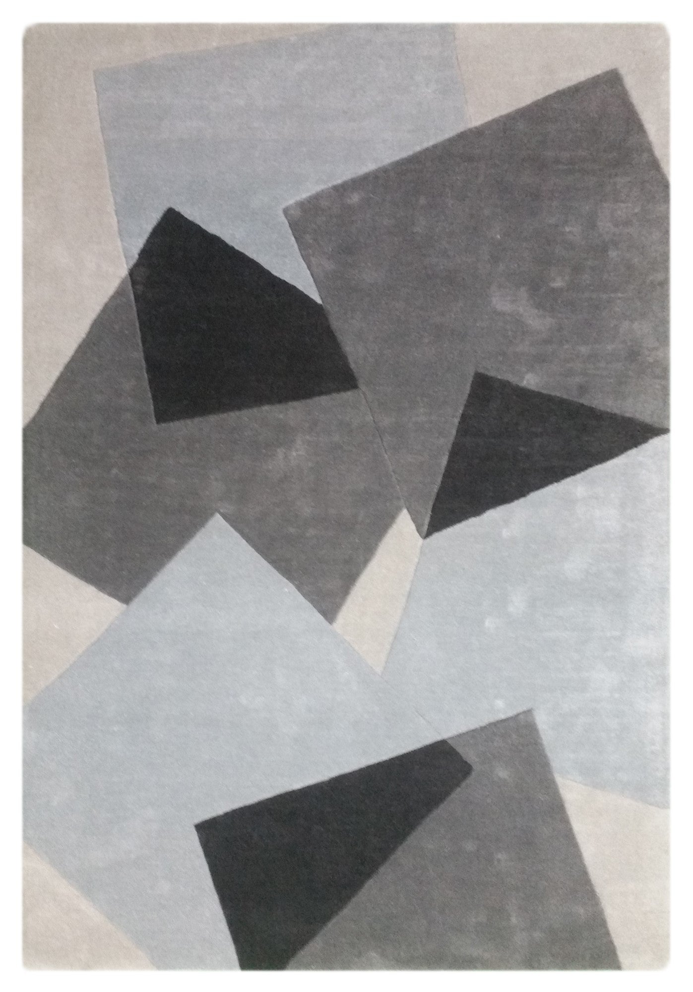 Elégant tapis coloré à motif géométrique en polyester