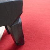 Vloerkleed rood effen van wol – Harmony – detail van de rand