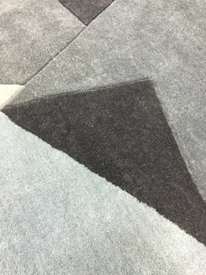 Elégant tapis coloré à motif géométrique en polyester