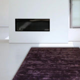 Tapis violet en viscose – Everest Plain, dans un salon